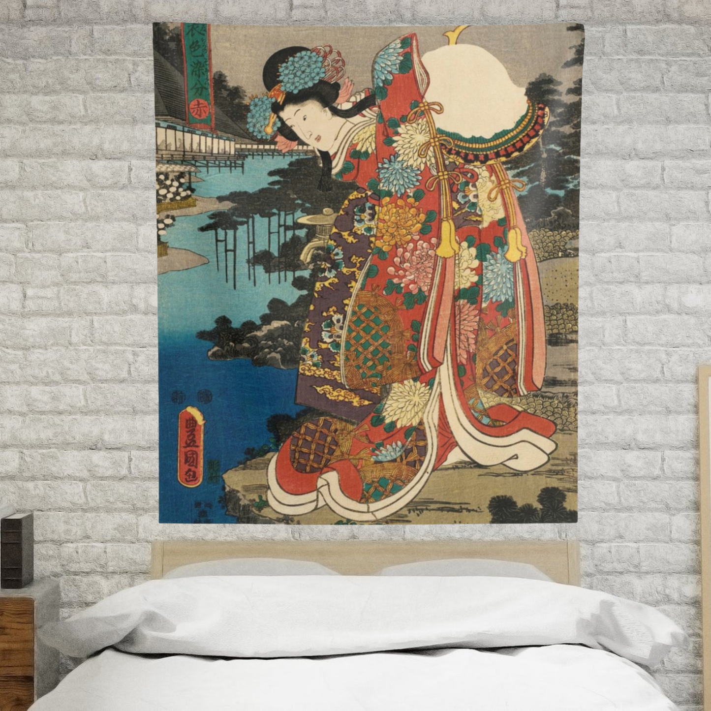 a bed with a painting on the wall above it