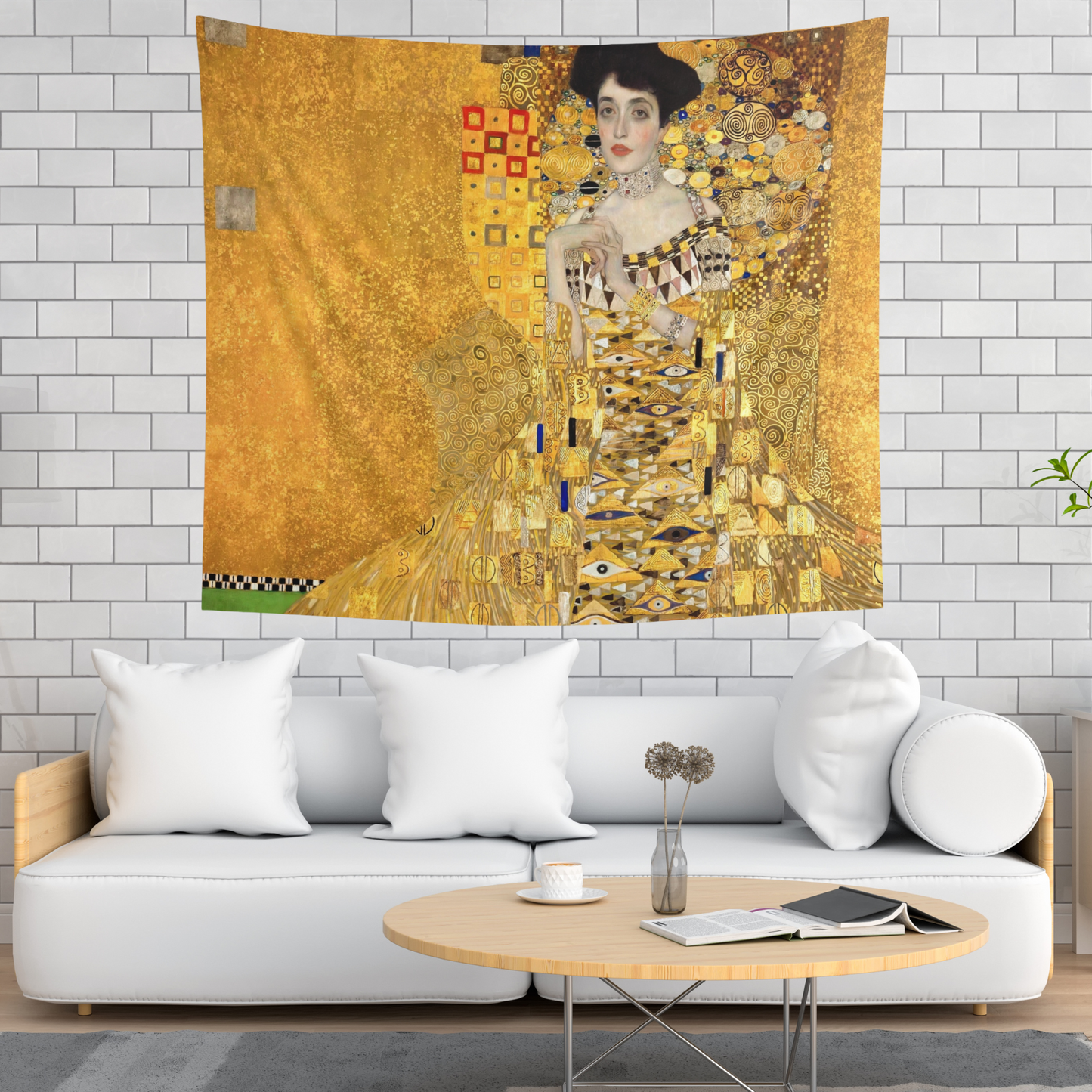 a living room with a white couch and a painting on the wall