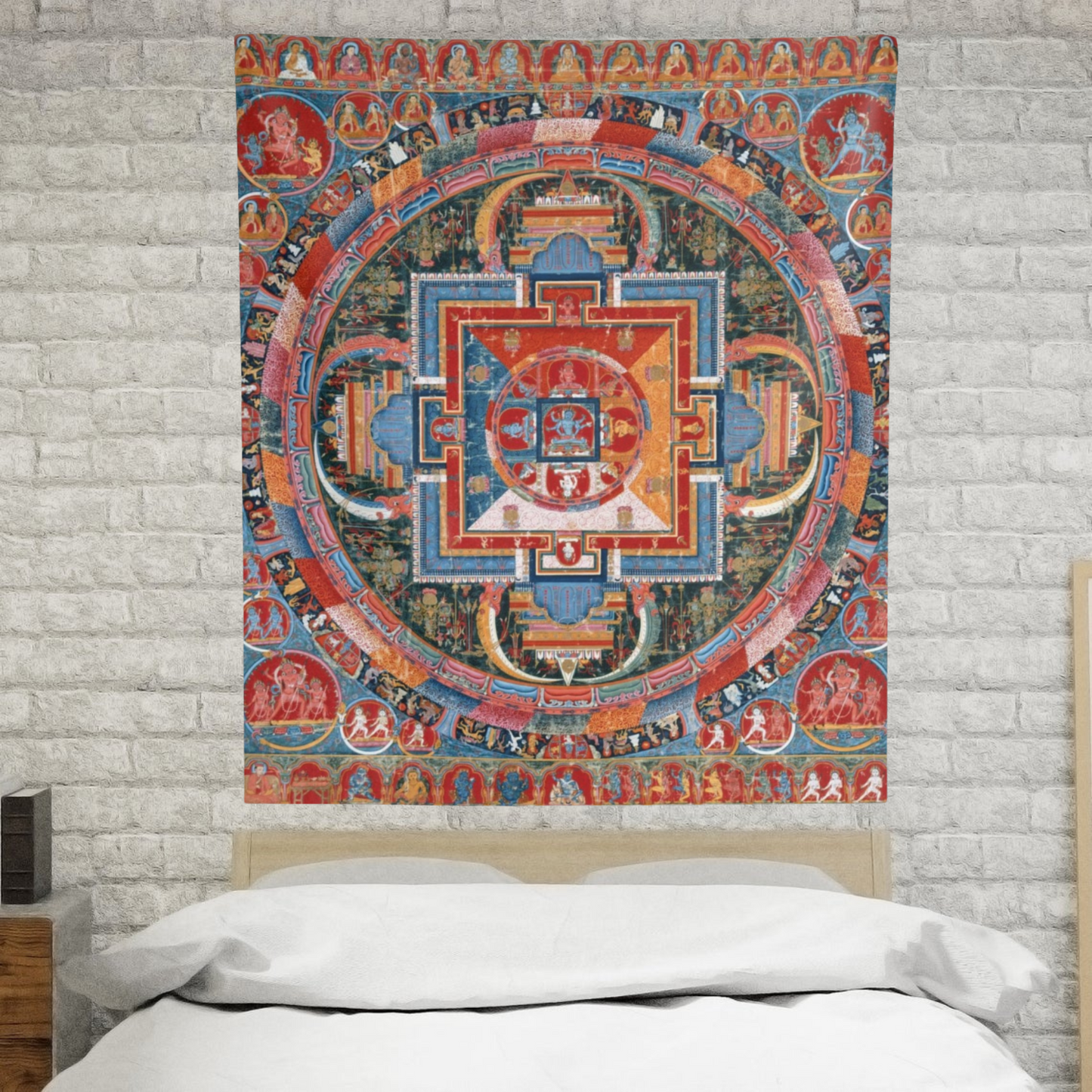 a tapestry hanging on a brick wall above a bed