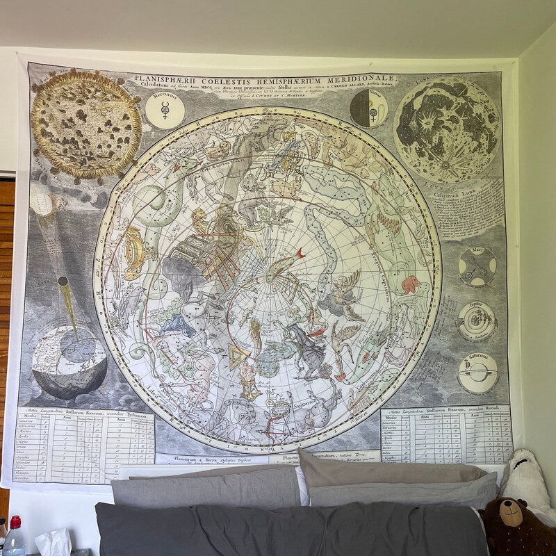 a large map hanging on the wall of a bedroom