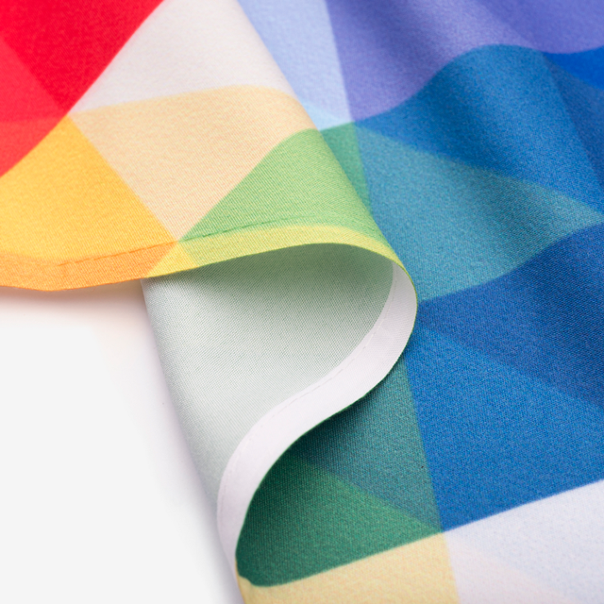 a multicolored fabric with a white background