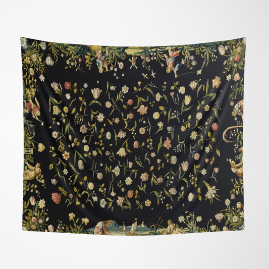 a black wall hanging with a floral pattern